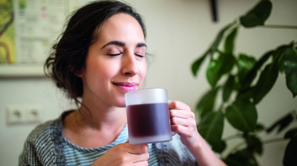 woman drinking tea mindfully